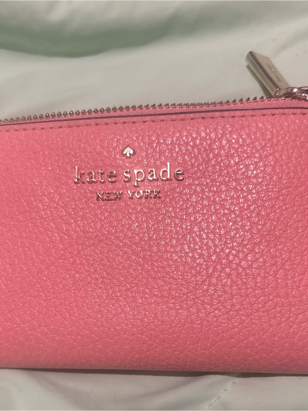 kate spade pink pebble leather zip wallet with silver logo C/O